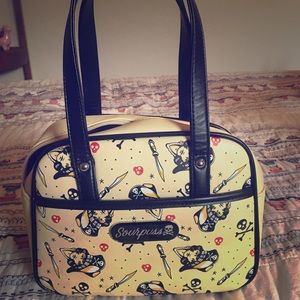 Sourpuss tattoo purse